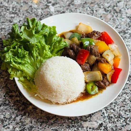 Vietnamese shaking beef ( Cơm Bò Lúc Lắc).